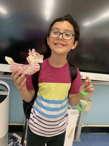 SWAN Afterschool student celebrates Dragon Boat Festival with crafts